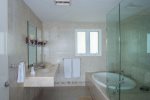 Master bathroom with tub